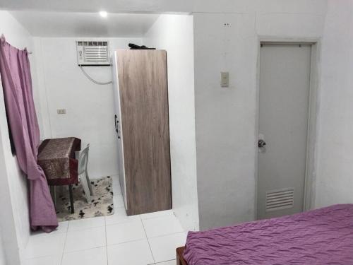 Voodi või voodid majutusasutuse Home in General Santos City toas