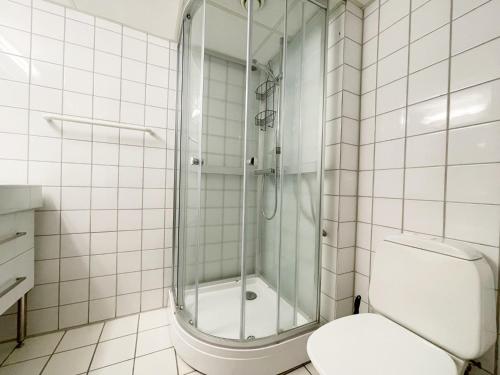 a bathroom with a shower and a toilet at Actif 329 - apartment by Ål skisenter in Ål