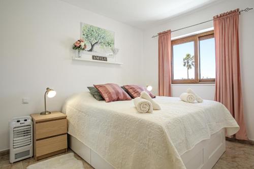 Postel nebo postele na pokoji v ubytování Sand Club Apartment 202