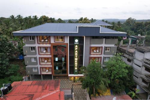 Φωτογραφία από το άλμπουμ του Ncomforts Luxurious Apartments σε Perintalmanna