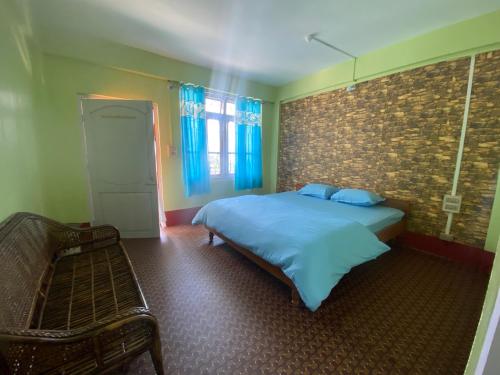 Ένα ή περισσότερα κρεβάτια σε δωμάτιο στο DPM HOMESTAY