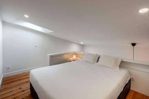 Postel nebo postele na pokoji v ubytování House Páteo da Lapa 5