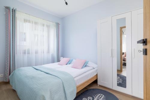 Ліжко або ліжка в номері Cozy Apartment in Murzasichle near Tatra National Park by Renters