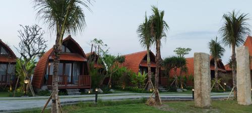 a group of houses with palm trees in front of them at Love Without boundaries num9843 in Siyut