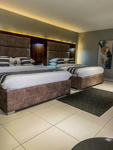 Katil atau katil-katil dalam bilik di GRAVITY HOTELS BY ACE