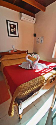 Cama o camas de una habitación en Apart Hotel Géminis