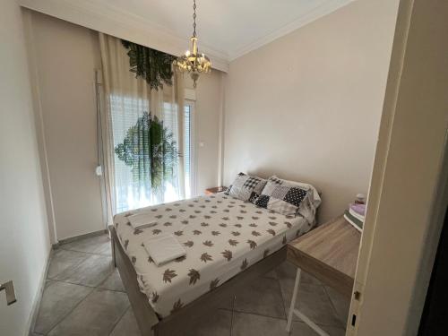 Posteľ alebo postele v izbe v ubytovaní Xronis apartments