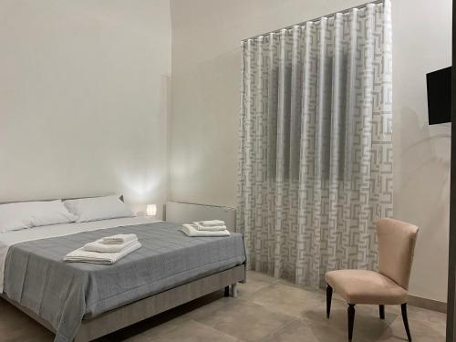 Postel nebo postele na pokoji v ubytování Home Paradise