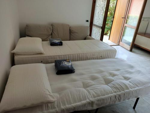 Кровать или кровати в номере Casa Ela Città Alta Hub