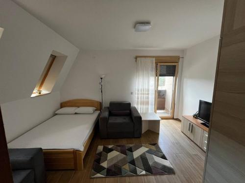 Postel nebo postele na pokoji v ubytování Sova apartman