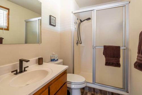 a bathroom with a sink and a shower at Immaculate, Cozy Home in Downtown Redmond in Redmond