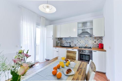 Η κουζίνα ή μικρή κουζίνα στο Apartments Kampanel