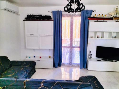Μια τηλεόραση ή/και κέντρο ψυχαγωγίας στο Belvedere House Holiday Siracusa Ortigia