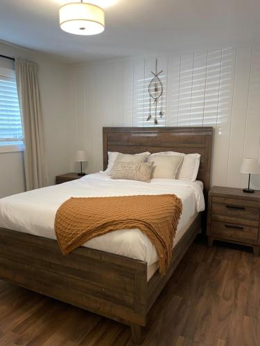 a bedroom with a large bed with white sheets and pillows at Diamond Vacation Home in Wine Country Sonoma! in Sonoma