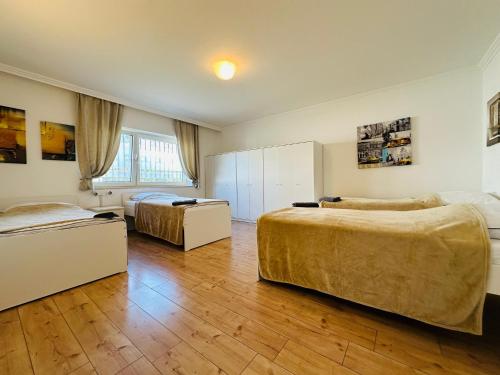 Ένα ή περισσότερα κρεβάτια σε δωμάτιο στο Emilbnb in der Sandstraße