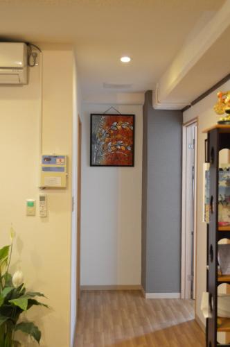 Μια τηλεόραση ή/και κέντρο ψυχαγωγίας στο Guest House Fukutomi - Female Only