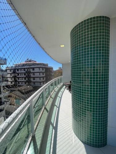 a view of a balcony of a building at Apto acolhedor na Passagem in Cabo Frio