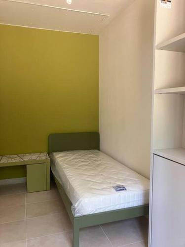 Katil atau katil-katil dalam bilik di Casa vacanze iBiagi