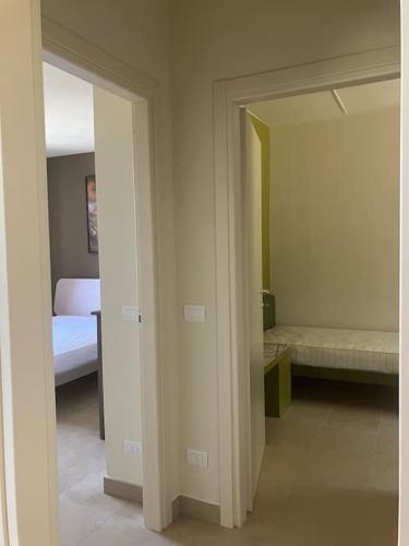 Katil atau katil-katil dalam bilik di Casa vacanze iBiagi