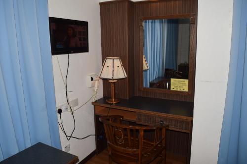 Телевизор и/или развлекательный центр в Hotel Sri Garden Sdn. Bhd.