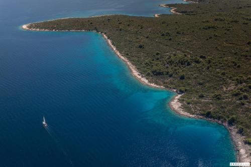 an aerial view of a boat in the ocean at Sonia Hvar in Rudina
