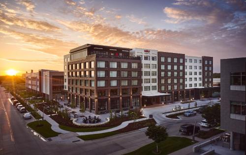a rendering of a building in a city at sunset at The Scarlet, Lincoln, a Tribute Portfolio Hotel in Lincoln