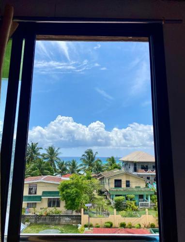 a view from a window of a resort at Anda Seabreeze Pension Haus in Anda
