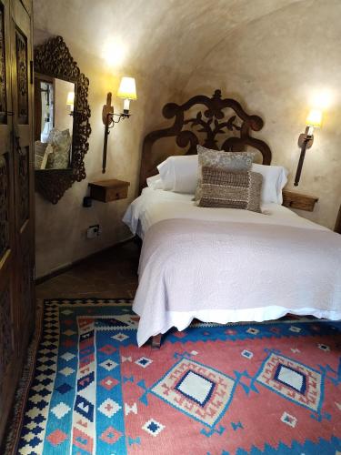 Cama o camas de una habitación en Hacienda Las Amantes