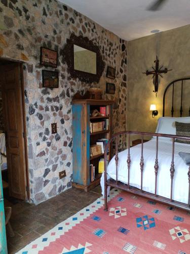 Cama o camas de una habitación en Hacienda Las Amantes