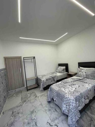 Ein Bett oder Betten in einem Zimmer der Unterkunft Zaman Ya Zaman Boutique Hotel