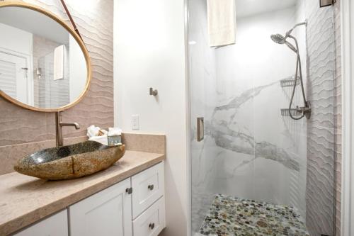 a bathroom with a sink and a shower at K B M Resorts- KRV-2823 Large 1Bd with 180-degree ocean views perfect for whale watching in Kaanapali