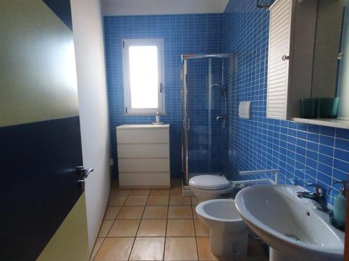 Ένα μπάνιο στο Camelia 12 Apartments