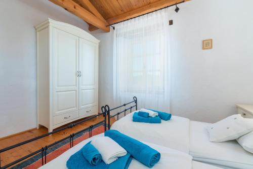 Ένα ή περισσότερα κρεβάτια σε δωμάτιο στο Sienna