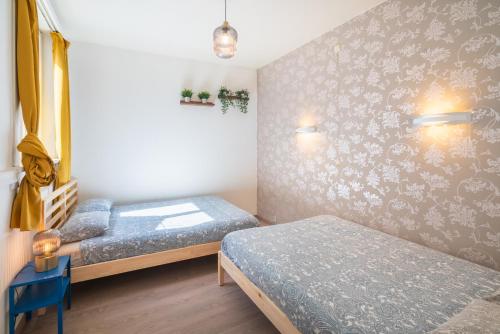 Ένα ή περισσότερα κρεβάτια σε δωμάτιο στο Large Antwerp City Center Apartments