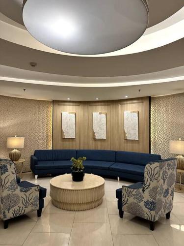 Posezení v ubytování Shell res nr MOA 2BR free parking