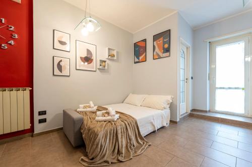 Postel nebo postele na pokoji v ubytování 10min dal Centro [PortaSusa-FreeParking&AC]