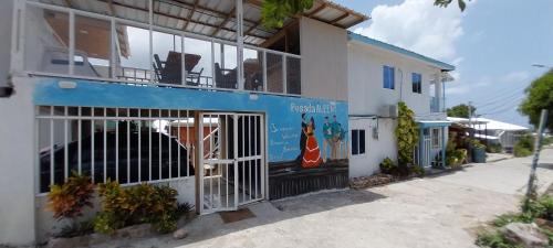 a building with a gate in front of it at POSADA ALEENY in Providencia