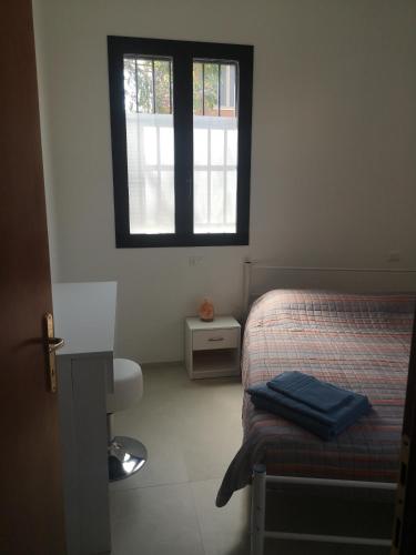 A Casa di Amiciにあるベッド