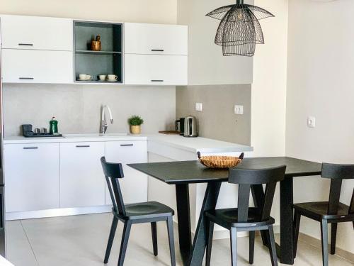 Una cocina o cocineta en Made of Blue luxury suites collection