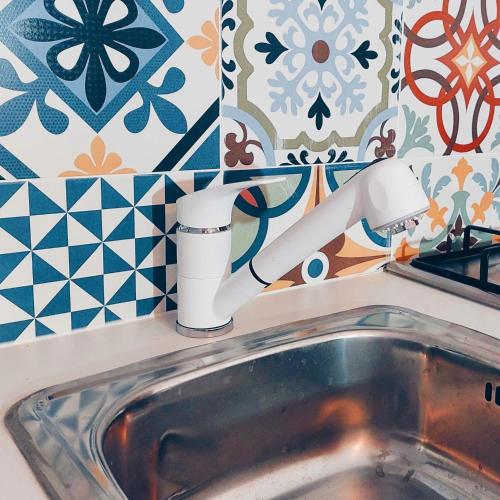 a bathroom with a sink and a faucet at Casas da Olaria in Aldeia do Mato