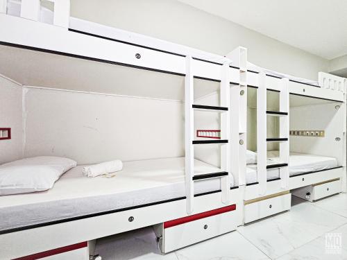 Postel nebo postele na pokoji v ubytování MANERO POUSADA e HOSTEL