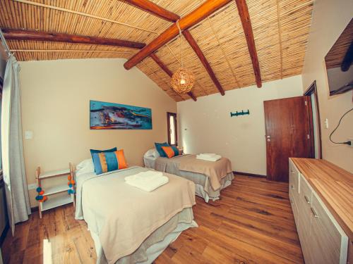 1 Schlafzimmer mit 2 Betten in einem Zimmer in der Unterkunft Pucara Lodge 1D in Tilcara