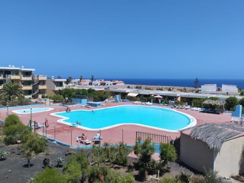 Bazén v ubytovaní Apartamento Costa de Antigua cerca de Caleta de Fuste alebo v jeho blízkosti