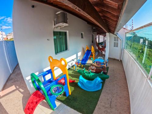 a balcony with a bunch of play equipment at CASA TORRES in Bonito
