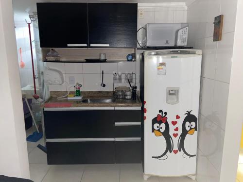 Dapur atau dapur kecil di Apart - em frente á praia dos milionários- Ilhéus