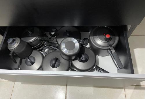 Dapur atau dapur kecil di Apart - em frente á praia dos milionários- Ilhéus