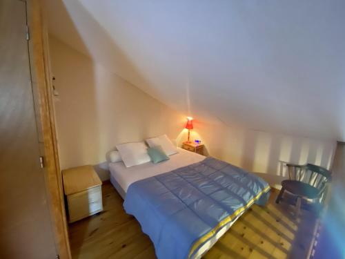 Katil atau katil-katil dalam bilik di Chalet cosy 55m², 8 pers, garage, prox. pistes, animaux admis - FR-1-758-6