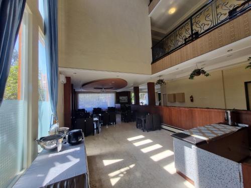 Kuchyň nebo kuchyňský kout v ubytování core inn juwita hotel