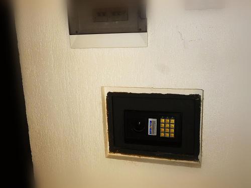 a electrical outlet on the wall of a room at Ditton apartment city center in Daugavpils