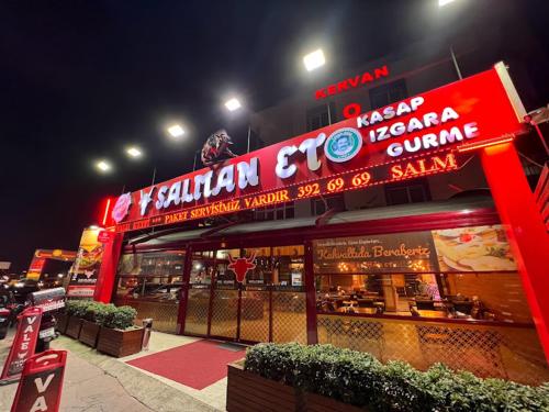 a restaurant with a sign on the front of it at Kervan Hotel Pendik in Istanbul